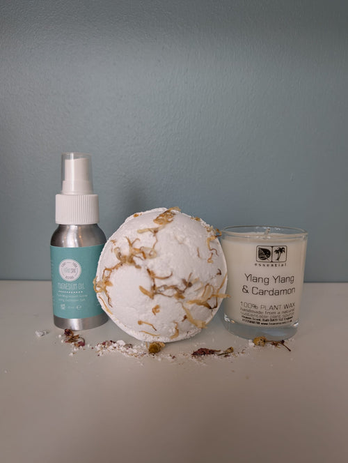 Bath bomb, bottle, and candle 