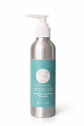 Hand and body lotion bottle with pump on a white background